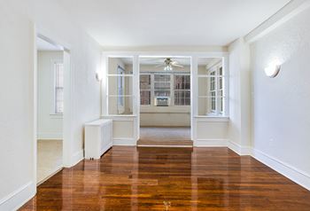 Living and sunroom (virtually staged) at Paramount, Washington, DC, 20011